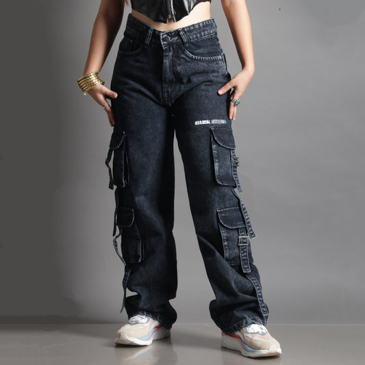 Front view of model wearing the Midneight Cargo Pants (Women's), with upper body cropped out to highlight the pants’ fit, design, and pocket placement.